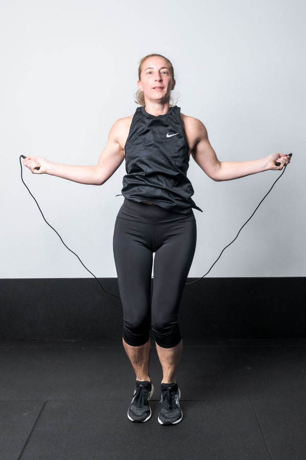 Skipping rope exercise for osteoporosis, woman exercising. 